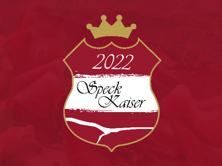 Rot-weiß-rotes Wappen mit goldener Krone darüber und Text "Speck-Kaiser 2022"