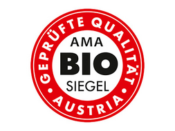 In einem roten Kreis mit weißer Mitte steht "Geprüfte Qualität Austria" und "AMA Biosiegel".