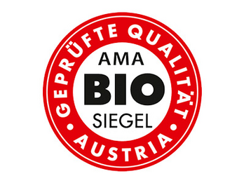 In einem roten Kreis mit weißer Mitte steht "Geprüfte Qualität Austria" und "AMA Biosiegel".